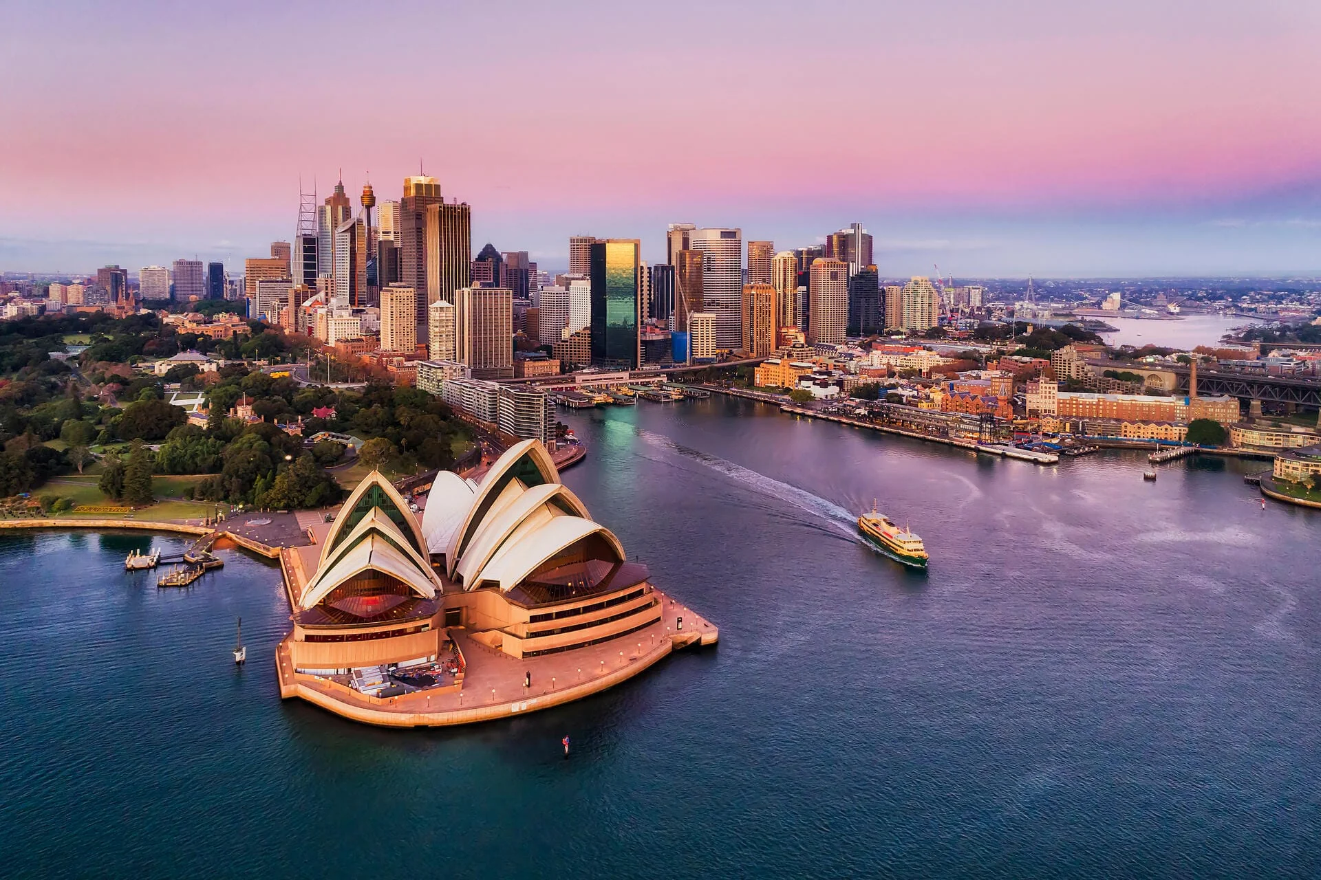 Sydney Opera House and Sydney skyline at sunset, Australia