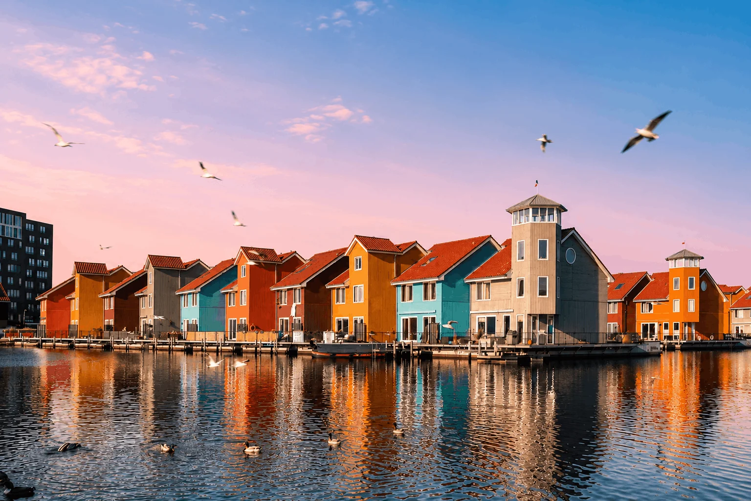Colorful waterfront homes in Reitdiephaven, Groningen, the Netherlands
