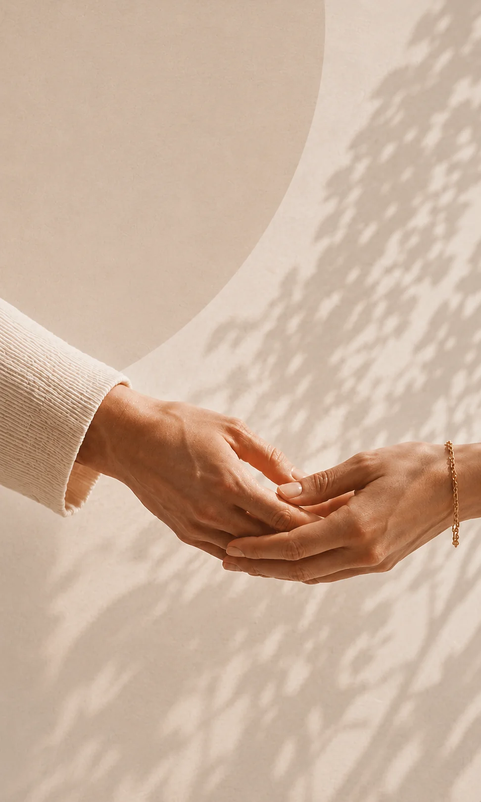 Two people gently holding hands, symbolizing trust, emotional support, and relationship coaching